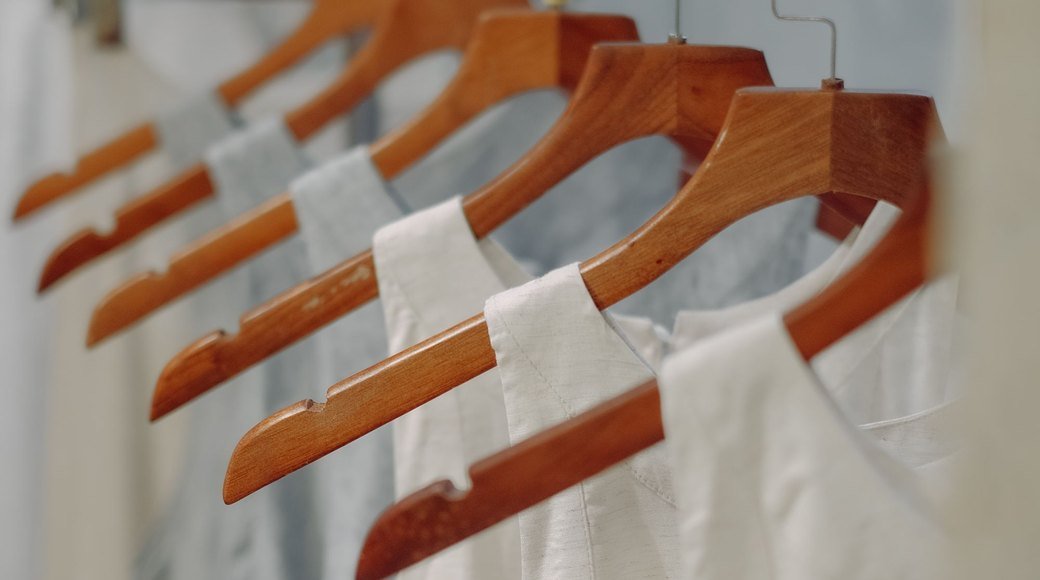 Wooden hangers with the eight pieces on them